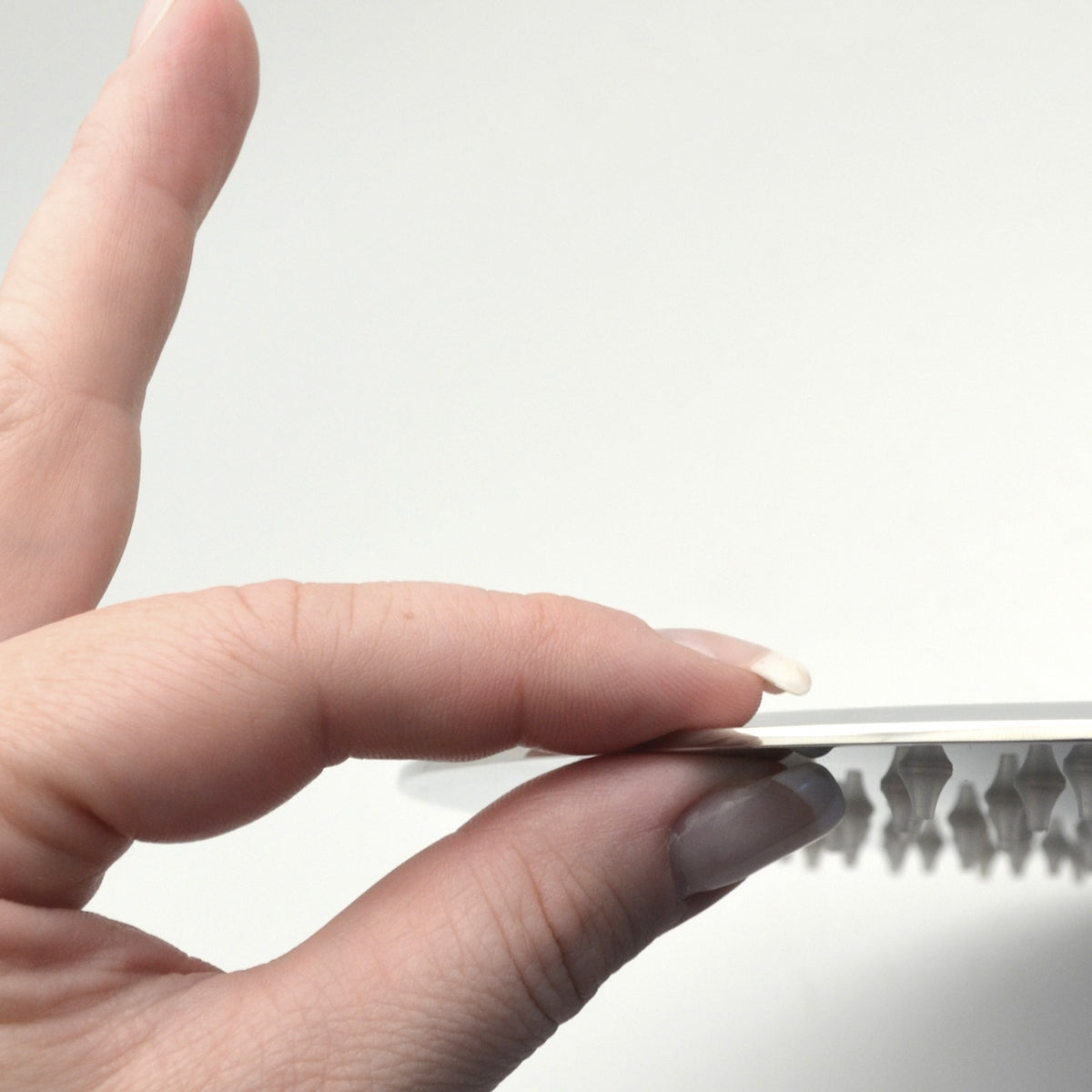 Pomme de douche ronde ultra fine en acier inoxydable