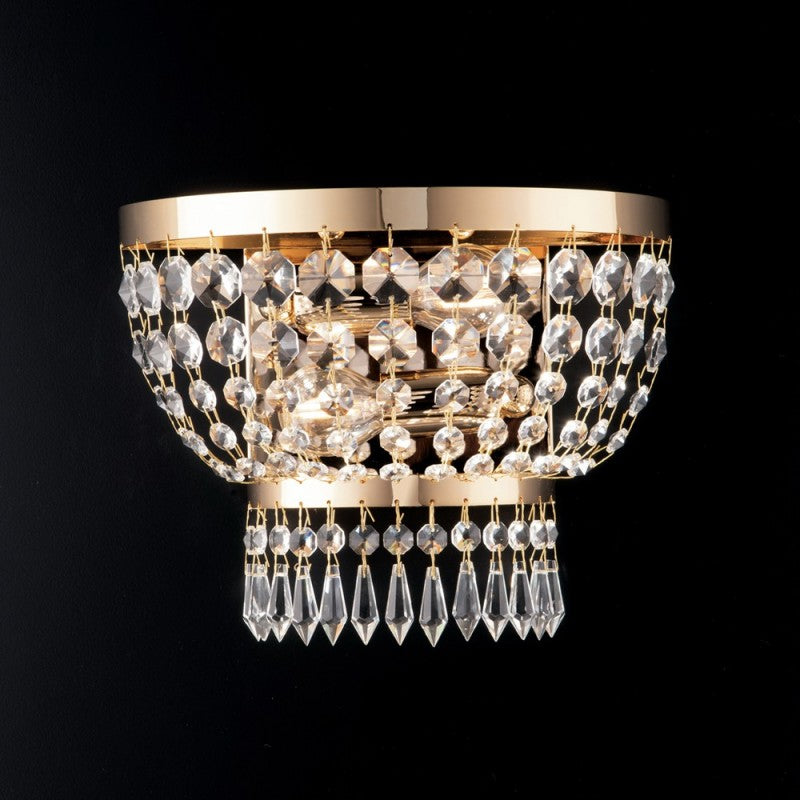 Applique impériale en fer doré et laiton à deux lumières 27x h22 cm