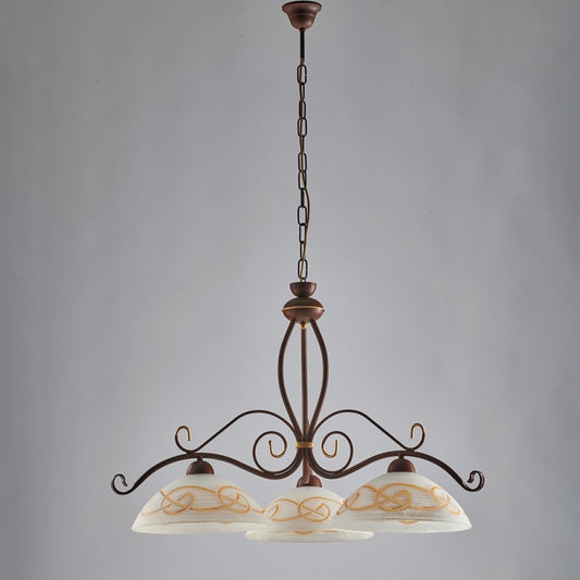 Lustre travaillé en fer noir rouillé finition dorée, trois lumières 71x h56 cm