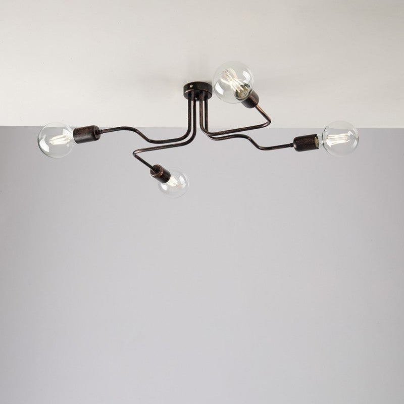 Plafonnier en fer noir décor cuivre, quatre lumières 57x44x h17 cm